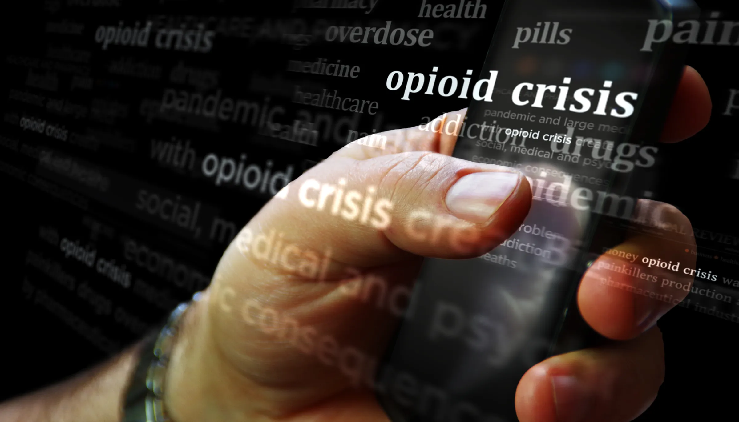 Close-up of a hand holding a smartphone, overlaid with floating news text reading "opioid crisis," "overdose," "addiction" and "pills"